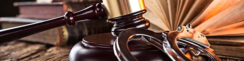 Wooden,Gavel,And,Books,On,Wooden,Table,,Law,Concept Woman jailed for Dh1 million extortion attempt after affair with married man ends